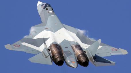 Futuristic Military Jet in Action wallpaper