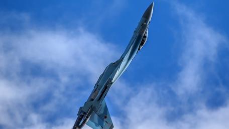 Majestic Fighter Jet in Agile Maneuvering wallpaper