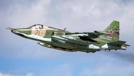Fierce Jet in Full Flight Above Clouds wallpaper