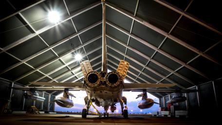 Majestic Military Aircraft in Hangar View wallpaper
