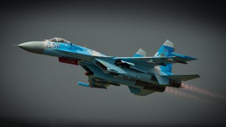 Sleek Su-57 Fighter Jet in Action wallpaper