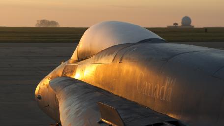 Golden Hour Military Aircraft Reflection Wallpaper wallpaper