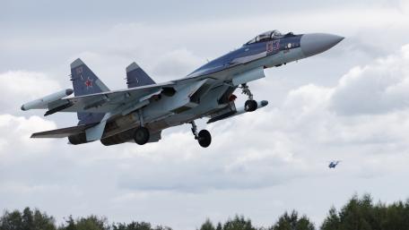 Sleek Su-35 Fighter Jet in Action wallpaper
