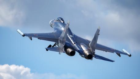 Sleek Military Jet in Flight wallpaper