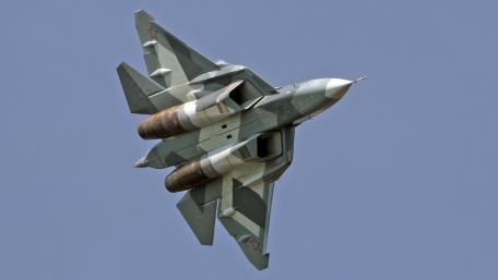 Sleek Fighter Jet in Majestic Flight wallpaper