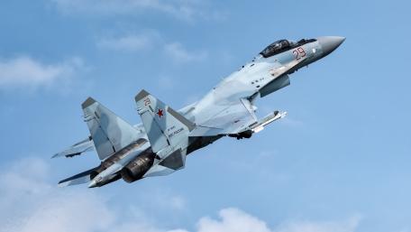 Sukhoi Fighter Jet in Flight Scene wallpaper