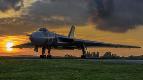 Majestic Bomber Under a Stunning Sunset wallpaper