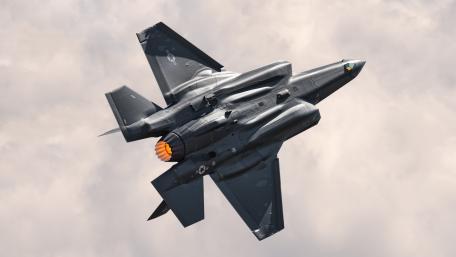 Fighter Jet in Dynamic Maneuvering Action wallpaper