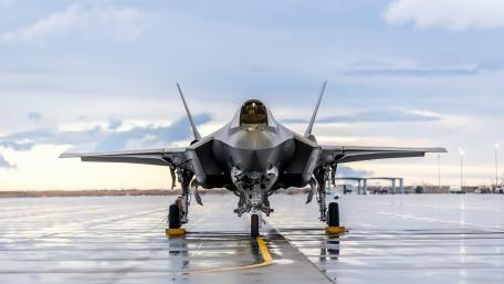 Futuristic Fighter Jet on the Runway wallpaper