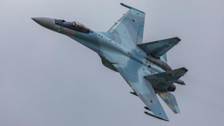 Sleek Su-35 Fighter Jet in Action wallpaper