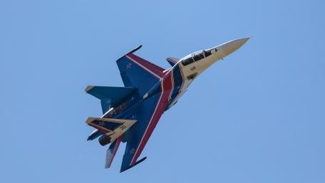 Fighter Jet Soaring Through the Skies wallpaper