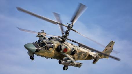 Military Helicopter in Action Overhead wallpaper