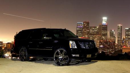 Urban Elegance of a Black Cadillac Escalade wallpaper