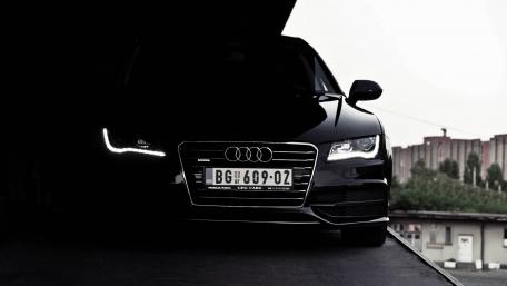 Sleek Audi A7 in Shadowy Garage wallpaper