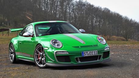Vibrant Green Sports Car Wallpaper wallpaper