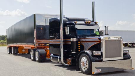 Sleek Black Truck with Vibrant Accents in 4K Quality wallpaper