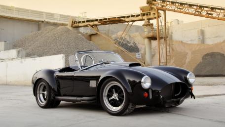 Classic Elegance of a Black Cobra Sports Car wallpaper