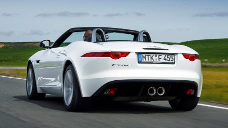 Sleek Convertible F-Type on Open Road wallpaper