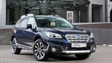 Sleek Subaru Outback in Urban Setting wallpaper
