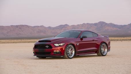 Sleek Red Mustang on Desert Canvas wallpaper