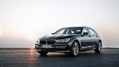 Sleek Luxury Sedan at Dawn wallpaper