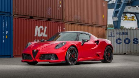 Sleek Red Alfa Romeo Sports Car Wallpaper wallpaper