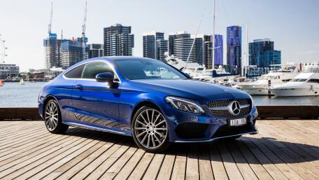 Sleek Blue Mercedes Coupe by the Waterfront wallpaper