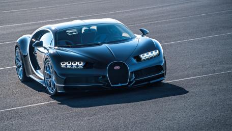 Sleek Luxury Car on the Track wallpaper