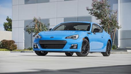 Sleek Blue Sports Car Wallpaper wallpaper
