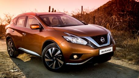 Sleek Nissan Murano in Stunning Sunset Landscape wallpaper