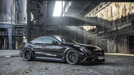 Sleek Black Beauty in Urban Setting wallpaper