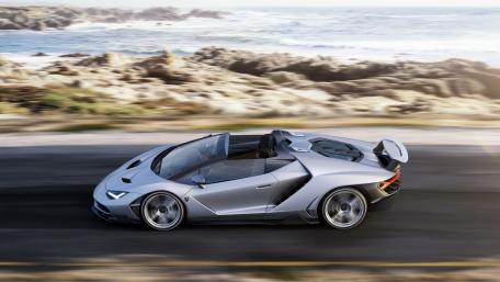 Sleek Performance in Motion with an Elegant Sports Car wallpaper