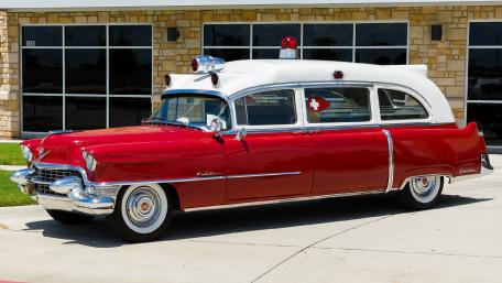 Classic Red and White Cadillac Ambulance Wallpaper wallpaper