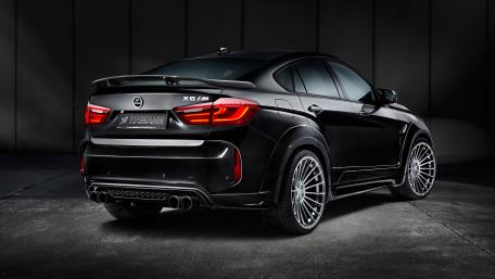 Sleek Black Sports Car Wallpaper wallpaper