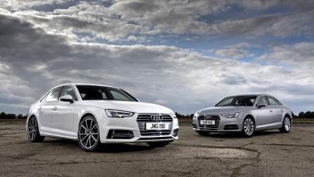 Sleek Audi Sedans Under Dramatic Skies wallpaper