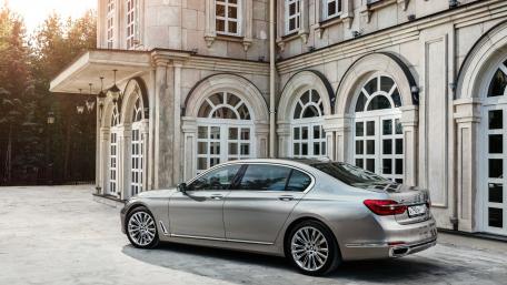 Elegant Luxury Car in Sophisticated Setting wallpaper