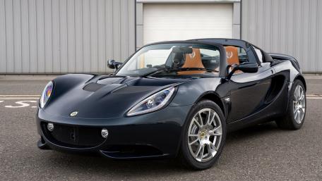 Sleek and Stylish Convertible Sports Car Wallpaper wallpaper