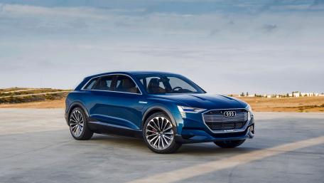 Sleek Audi Electric SUV in a Scenic Landscape wallpaper