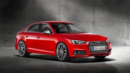 Sleek Red Audi S4 on Display wallpaper