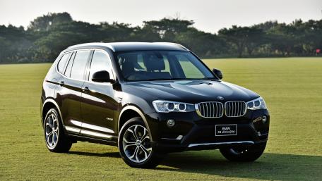 Sleek BMW X3 in Stunning Landscape View wallpaper