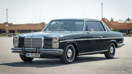 Classic Mercedes Coupe in Stunning Black Finish wallpaper