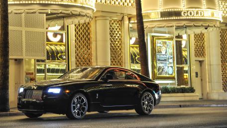 Sleek Elegance of Luxury Coupe at Night wallpaper