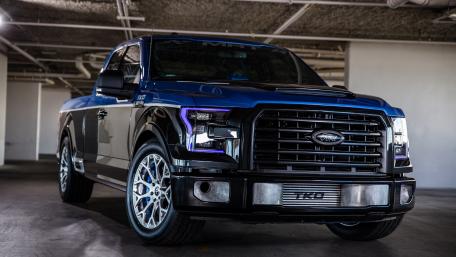 Stylish Black and Blue Pickup Truck Wallpaper wallpaper
