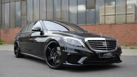 Sleek Black Luxury Sedan Wallpaper wallpaper