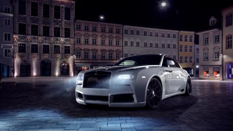 Sleek Nighttime Luxury Car Scene wallpaper