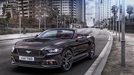 Sleek Mustang in Urban Setting for Car Enthusiasts wallpaper