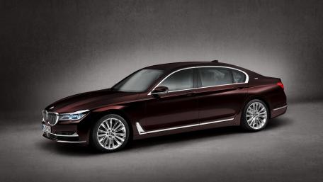 Elegant Luxury BMW in Rich Burgundy Shade wallpaper