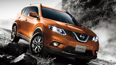 Dynamic Nissan X-Trail in Stunning Outdoor Setting wallpaper