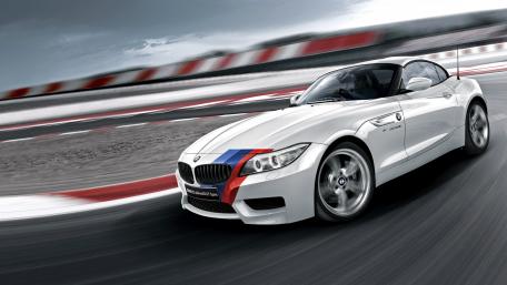 Sleek BMW Z4 Racing Along The Track wallpaper