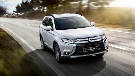 Sleek and Powerful Mitsubishi Outlander on the Road wallpaper